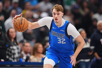 | Photo: AP/Julio Cortez : Dallas Mavericks forward Cooper Flagg dribbles the ball up court against the Miami Heat during the first half of an NBA basketball game in Dallas.