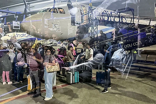 Photo: PTI/Kunal Patil : An IndiGo flight from Raipur lands at Chhatrapati Shivaji Maharaj International Airports Terminal 2, in Mumbai. Passengers were left stranded as IndiGo cancelled numerous flights while struggling to meet new crew rostering rules, a day after it scrapped several services and announced schedule adjustments.