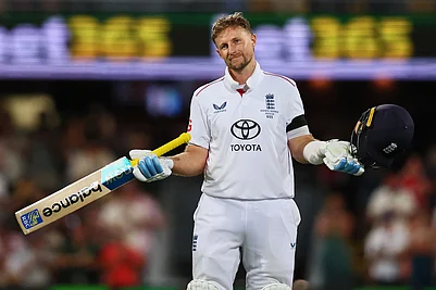 | Photo: AP/Tertius Pickard : Englands Joe Root celebrates his century during the second Ashes cricket test match between Australia and England in Brisbane.