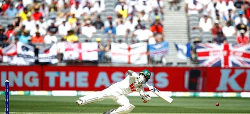 | Photo: AP/Gary Day : Australias Jake Weatherald loses his balance as he gets out lbw during the first Ashes cricket test match between Australia and England in Perth.