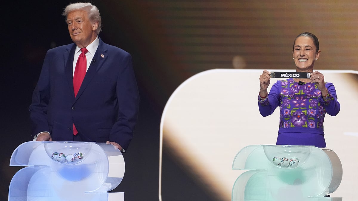 | Photo: AP/Evan Vucci : Mexican President Claudia Sheinbaum holds up the team name of Mexico as President Donald Trump looks on during the draw for the 2026 FIFA World Cup at the Kennedy Center in Washington on December 5, 2025.