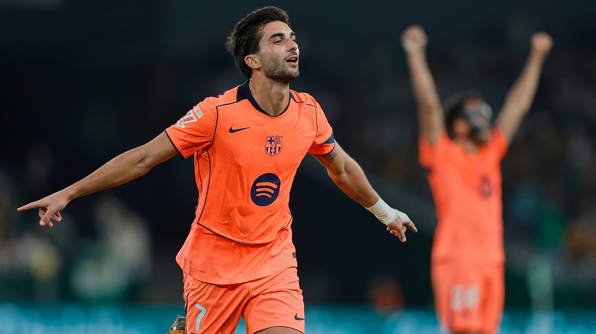 | Photo: AP/Manu Reino : Barcelona's Ferran Torres celebrates after scoring his side 4th goal and his third goal of the game during the Spanish La Liga match against Real Betis on December 6, 2025.