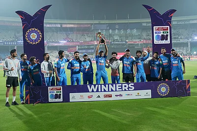 | Photo: AP/Mahesh Kumar A. : Indian players pose with the trophy after winning the third One Day International cricket match against South Africa in Visakhapatnam. India won the series by 2-1.