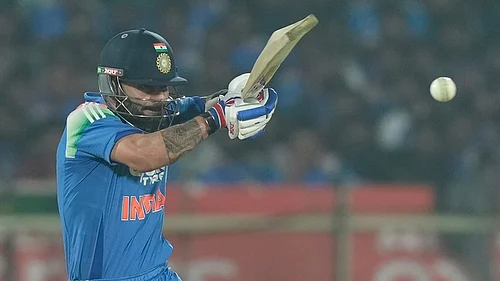 | Photo: AP/Mahesh Kumar A. : Indias Virat Kohli plays a shot during the third One Day International cricket match between India and South Africa in Visakhapatnam.