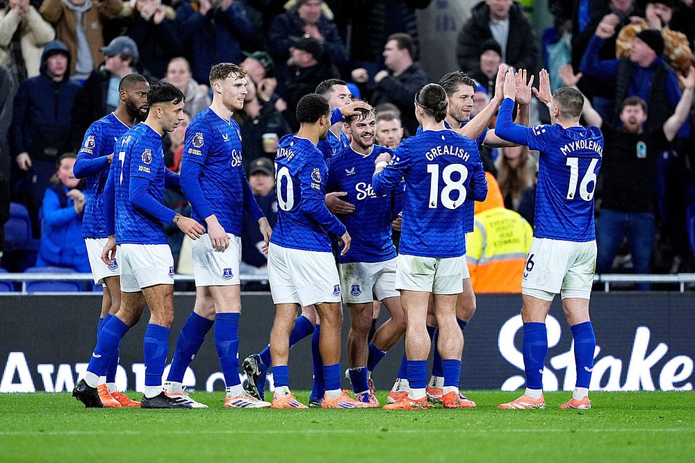| Photo: Peter Byrne/PA via AP : Everton's Kiernan Dewsbury-Hall, center, celebrates scoring with teammates during the English Premier League soccer match between Everton and Nottingham Forest in Liverpool, England.