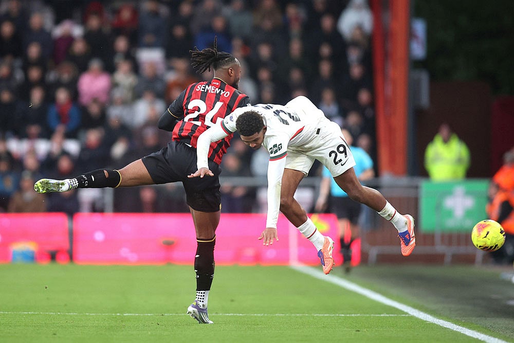 | Photo: Peter Tarry/PA via AP : Chelsea's Wesley Fofana, right, and Bournemouth's Antoine Semenyo in action during the English Premier League soccer match between Bournemouth and Chelsea in Bournemouth, England.