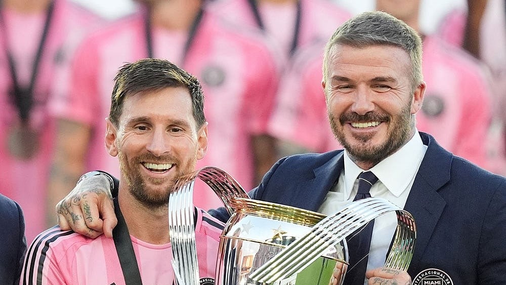 | Photo: AP/Rebecca Blackwell : David Beckham poses with the MLS Cup trophy with Inter Miami forward Lionel Messi in Fort Lauderdale, Fla.