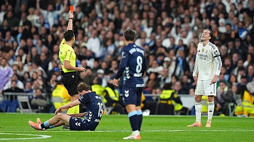 Alvaro Carreras receives a red card.