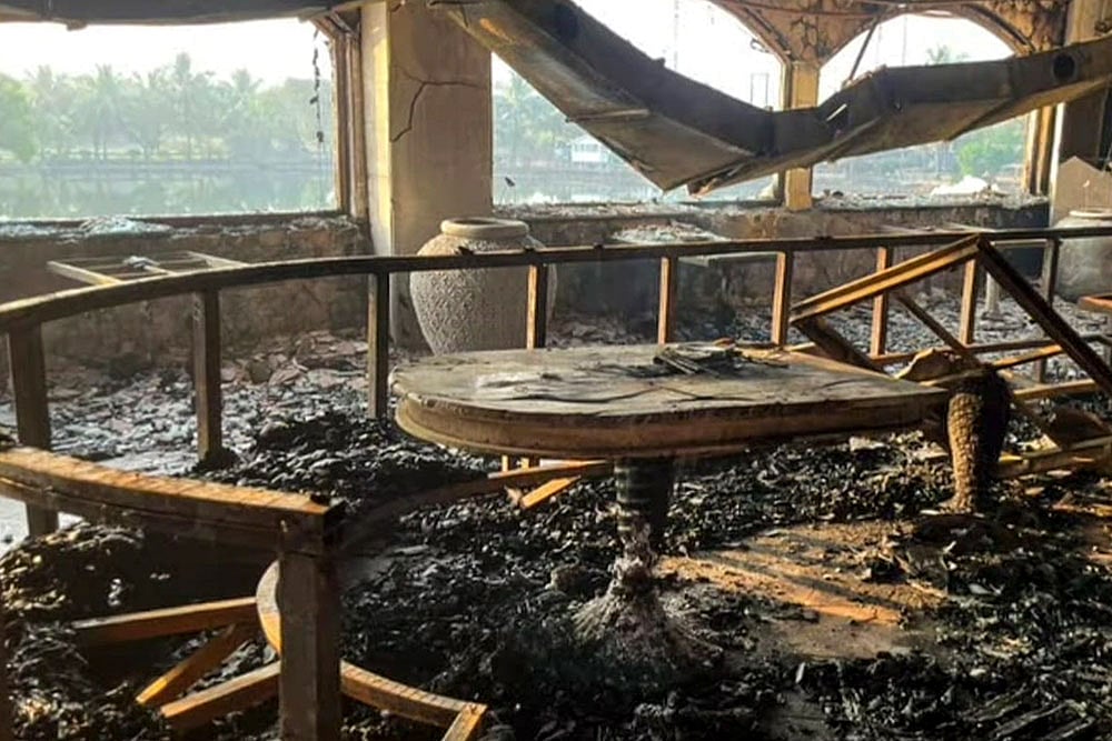 | Photo: PTI : Charred remains at the nightclub where a fire broke out due to a cylinder blast, in North Goa district. At least 25 persons were killed and six others suffered injuries in the incident, according to officials.