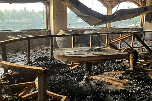 | Photo: PTI : Charred remains at the nightclub where a fire broke out due to a cylinder blast, in North Goa district. At least 25 persons were killed and six others suffered injuries in the incident, according to officials.