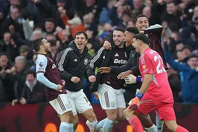 | Photo: AP/Dave Shopland : Aston Villa players celebrate after Aston Villas Emiliano Buendia, left, scored his sides second goal during the English Premier League soccer match between Aston Villa and Arsenal in Birmingham, England.