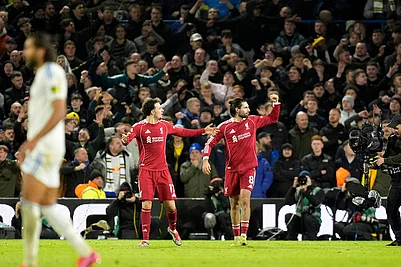 | Photo: Danny Lawson/PA via AP : Liverpools Dominik Szoboszlai celebrates scoring during the English Premier League soccer match between Leeds United and Liverpool in Leeds, England.