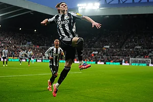 | Photo: Owen Humphreys/PA via AP : Newcastle United's Anthony Gordon celebrates after scoring his sides second goal during the English Premier League soccer match between Newcastle United and Burnley in Newcastle upon Tyne, England.