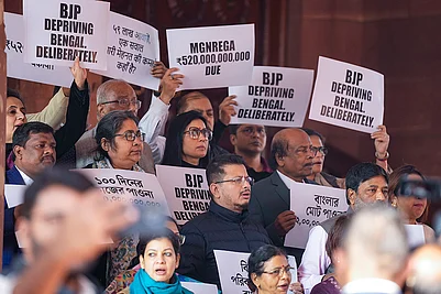 | Photo: PTI/Salman Ali : TMC MPs Mahua Moitra, Dola Sen and others stage a protest over the issue of pending Central dues for West Bengal, during the Winter session of Parliament, in New Delhi.