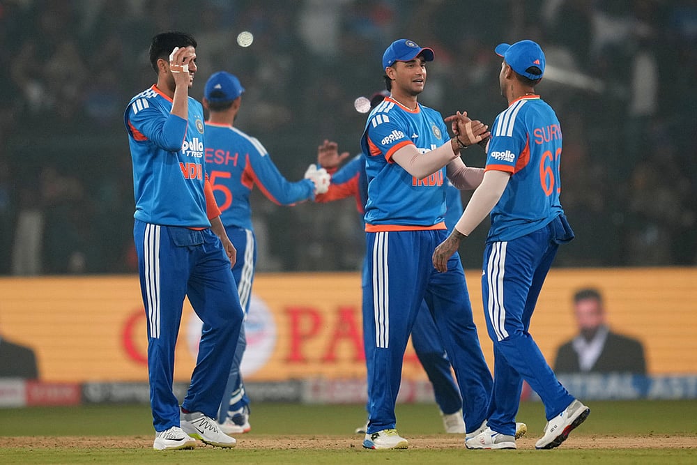 | Photo: AP/Rafiq Maqbool : Indias captain Suryakumar Yadav, right, with teammates celebrates after winning the first T20 International cricket match between India and South Africa in Cuttack.