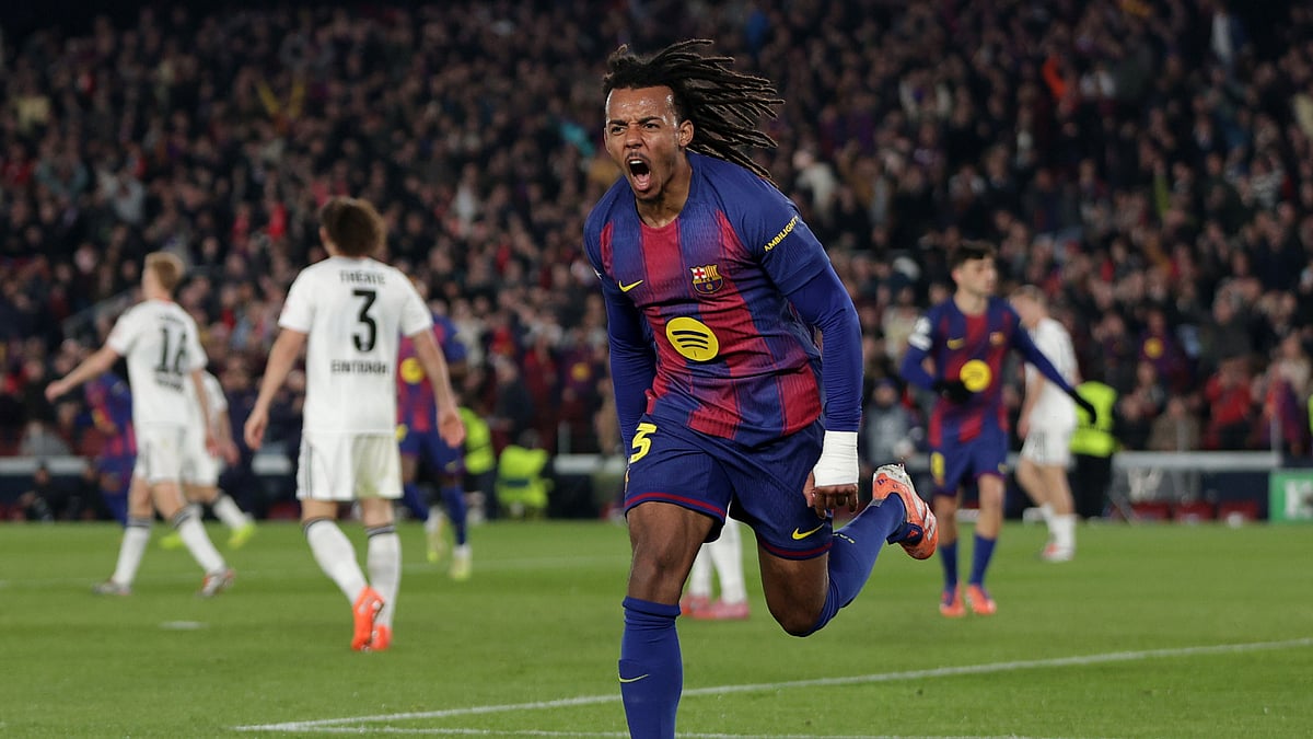 Barcelona's Jules Kounde celebrates after scoring during the UEFA Champions League match against Eintracht Frankfurt.