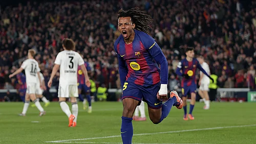 Barcelonas Jules Kounde celebrates after scoring during the UEFA Champions League match against Eintracht Frankfurt.