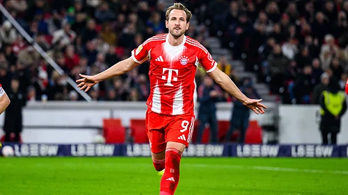 | Photo: dpa/Tom Weller via AP : Bayern Munichs Harry Kane celebrates after scoring his sides fourth goal during the German Bundesliga match against VfB Stuttgart on December 6, 2025.