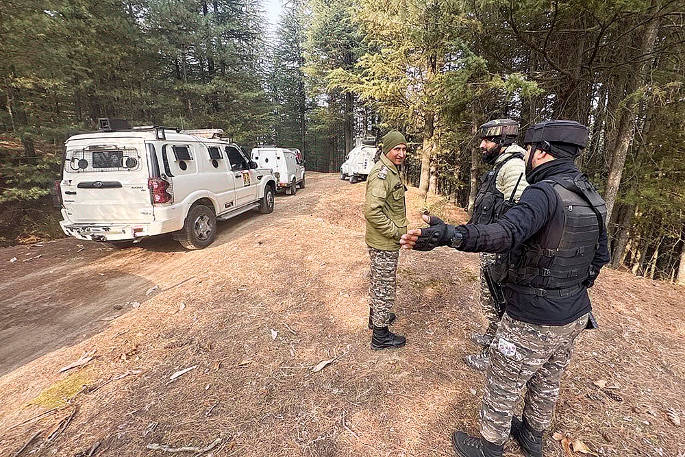 | Photo: PTI : Security personnel conduct searches in the Hutmurah forest area as part of the ongoing investigation linked to the Delhi blast case, in Anantnag district, Jammu and Kashmir.
