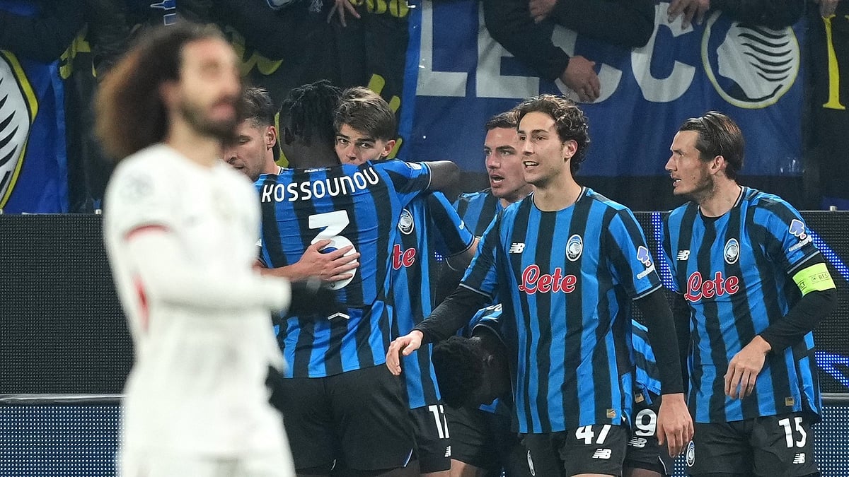 | Photo: AP/Antonio Calanni : Atalanta's Charles De Ketelaere celebrates after scoring his side's second goal during the UEFA Champions League opening phase match against Chelsea on December 9, 2025.