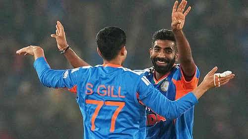 AP Photo/Rafiq Maqbool : Indias Jasprit Bumrah celebrates with Indias Shubman Gill the wicket of South Africas Keshav Maharaj during the first T20 International cricket match between India and South Africa in Cuttack, India, Tuesday, Dec. 9, 2025.