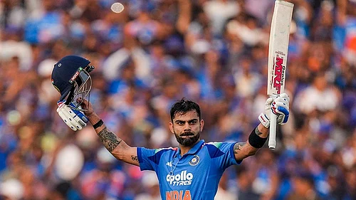 | Photo: PTI/Kunal Patil : Indias Virat Kohli celebrates his century during the second ODI cricket match of a series between India and South Africa, at Shaheed Veer Narayan Singh International Stadium, in Raipur, Chhattisgarh.