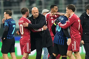 | Photo: AP/Luca Bruno : Liverpool's manager Arne Slot hugs Liverpool's Alexis Mac Allister at the end of a Champions League, league phase, soccer match between Inter Milan and Liverpool in Milan, Italy.