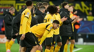 | Photo: AP/Bernd Thissen : Borussia Dortmund's Jobe Bellingham reacts after the UEFA Champions League opening phase match against Bodo/Glimt on December 10, 2025.