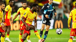 | Photo: AP/Jean-Francois Badias : Lens' Odsonne Edouard kicks the ball during the French League 1 match against Marseille on October 25, 2025.