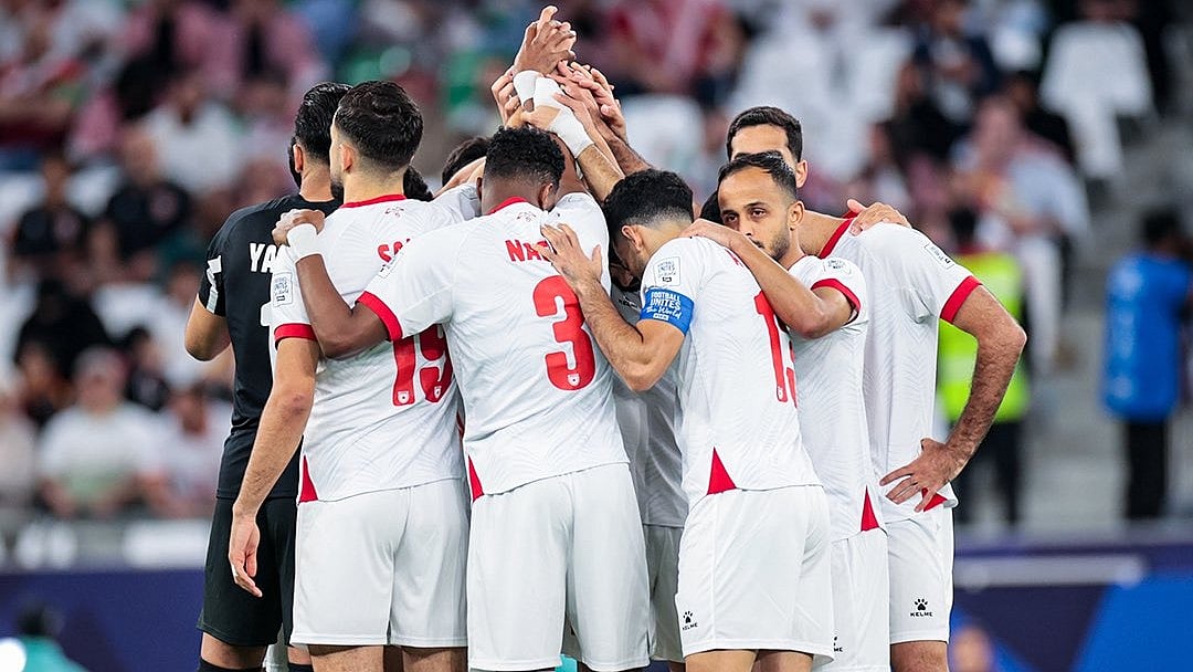 | Photo: X/JordanFA : Jordan players celebrate after their first goal during the FIFA Arab Cup match against Iraq on December 12, 2025.