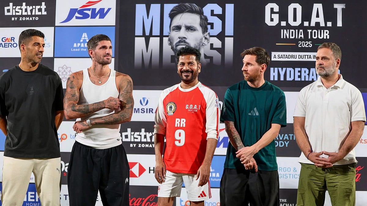 AICC via PTI Photo : Leader of Opposition in the Lok Sabha Rahul Gandhi and Telangana Chief Minister Revanth Reddy with Argentine footballer and 2022 FIFA World Cup winning captain Lionel Messi and his Inter Miami teammates Rodrigo De Paul and Luis Suarez.