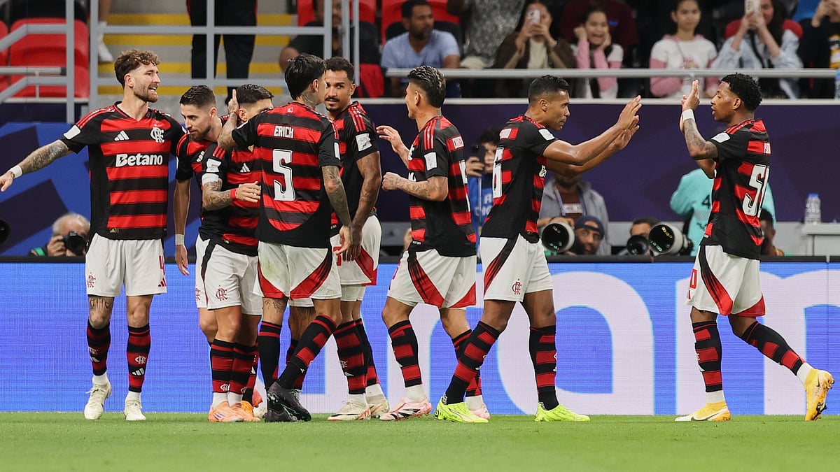 (AP Photo/Hussein Sayed) : Flamengo's Danilo, center, celebrates with his teammates after scoring his side's second goal during the FIFA Intercontinental Cup soccer match between Flamengo and Pyramids in Doha, Qatar, Saturday, Dec. 13, 2025