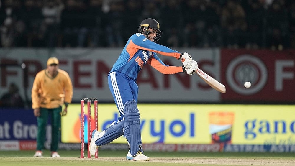 | Photo: AP/Ashwini Bhatia : Indias Abhishek Sharma plays a shot during the third T20 cricket match between India and South Africa in Dharamshala.
