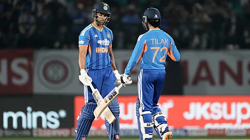 (AP Photo/Ashwini Bhatia) : Indias Shivam Dube, left, and Tilak Varma greets each other after India won the match during the third T20 cricket match between India and South Africa in Dharamshala, India, Sunday, Dec. 14, 2025