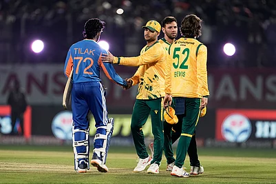 | Photo: AP/Ashwini Bhatia : South Africas captain Aiden Markram congratulate Indias Tilak Varma, left, after India won the match during the third T20 cricket match between India and South Africa in Dharamshala.