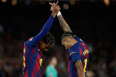 | Photo: AP/Joan Monfort : Barcelonas Raphinha and Lamine Yamal celebrate after a goal during a La Liga soccer match between Barcelona and Osasuna in Barcelona, Spain.