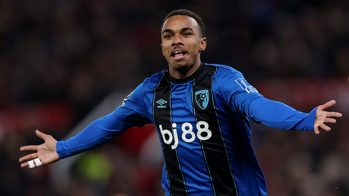 Junior Kroupi celebrates his goal at Old Trafford