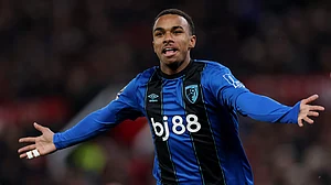 Junior Kroupi celebrates his goal at Old Trafford