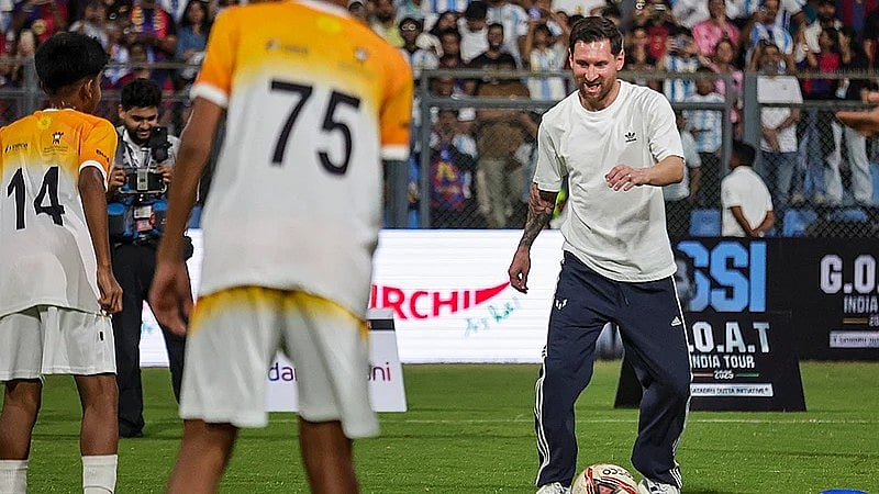 PTI : Argentine footballer Lionel Messi kicks a football during the GOAT India Tour 2025, at Wankhede Stadium, in Mumbai. 