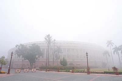 | Photo: PTI/Shahbaz Khan : A view of the Parliament House complex on a foggy winter morning, in New Delhi.
