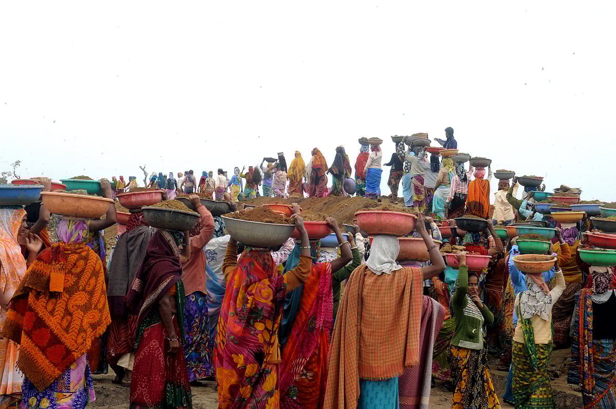 Tribhuvan Tiwari : Workers under National Rural Employment Guarantee Act (NREGA) scheme at Baran district, Rajasthan, India on 22nd February 2014. 