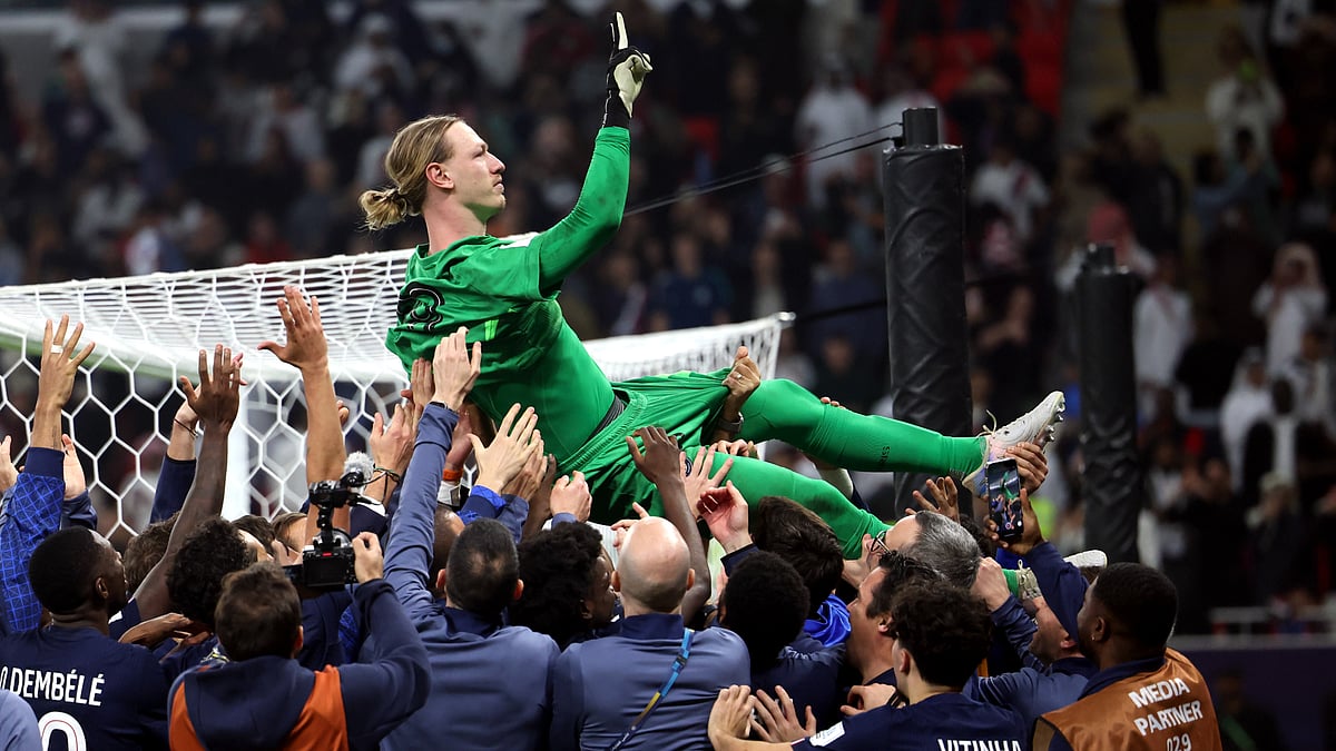 Matvey Safonov is carried by his team-mates after PSG's win