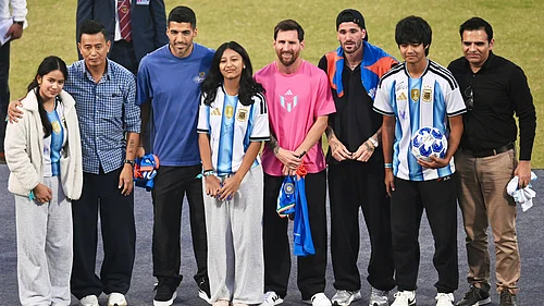 | Photo: AP : Lionel Messi and teammates Rodrigo De Paul and Luis Suarez pose with former Indian footballer Bhaichung Bhutia and others during their India tour in New Delhi on December 15, 2025.