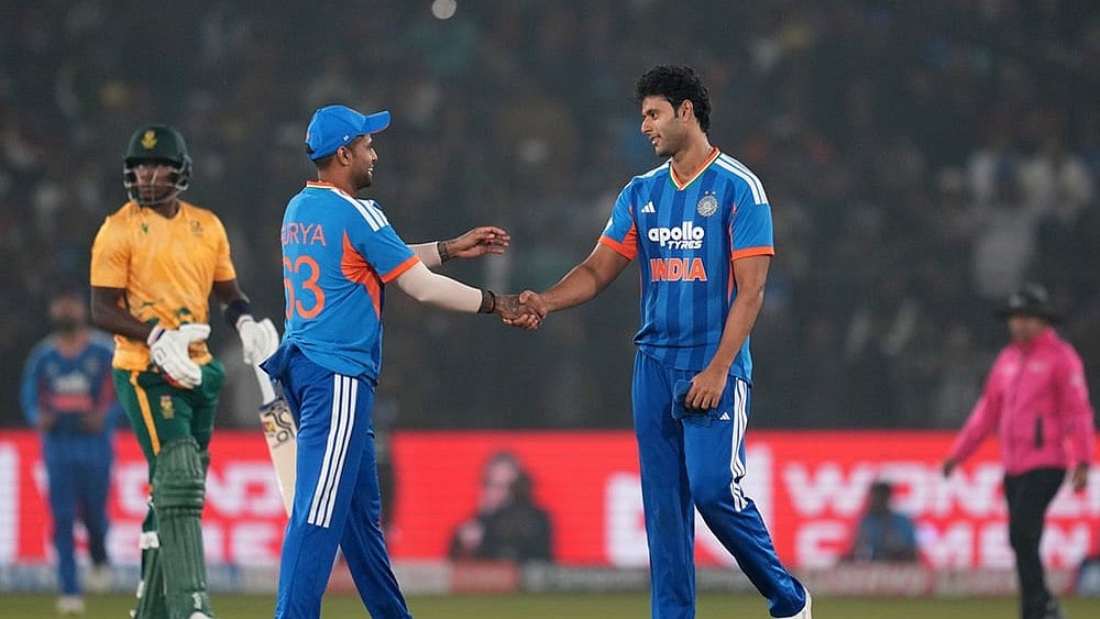 | Photo: AP/Rafiq Maqbool : Indias Shivam Dube, right, congratulates Indias captain Suryakumar Yadav after winning the first T20 International cricket match between India and South Africa in Cuttack.
