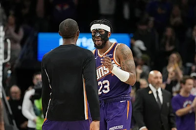 | Photo: AP/Ross D. Franklin : Phoenix Suns guard Jordan Goodwin (23) celebrates his game-winning free throw against the Golden State Warriors with Suns guard Jamaree Bouyea as time expires during the second half of an NBA basketball game in Phoenix.