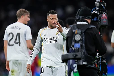 | Photo: AP/Manu Fernandez : Real Madrids Kylian Mbappe blows a kiss towards the TV camera as he celebrates after scoring his sides second goal during the Spanish La Liga soccer match between Real Madrid and Sevilla in Madrid, Spain.