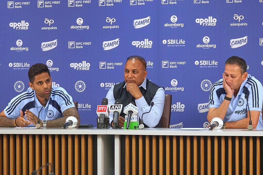 | Photo: AP/Rafiq Maqbool : Indian Mens T20 Captain Suryakumar Yadav, left, speaks as Board of Control for Cricket in India (BCCI) Secretary Devajit Saikia , centre, and Chief Selector Ajit Agarkar look on during a press conference for Indias squad announcement for the ICC Mens T20 World Cup 2026 at BCCI headquarter in Mumbai.