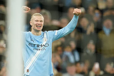 | Photo: AP/Dave Thompson : Manchester Citys Erling Haaland celebrates after scoring his sides third goal of the game during the English Premier League soccer match between Manchester City and West Ham United in Manchester, England.