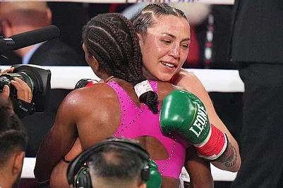 | Photo: AP/Lynne Sladky : Camila Panatta, right, embraces Caroline Dubois, left, after Dubois won their WBC lightweight world title fight in Miami.