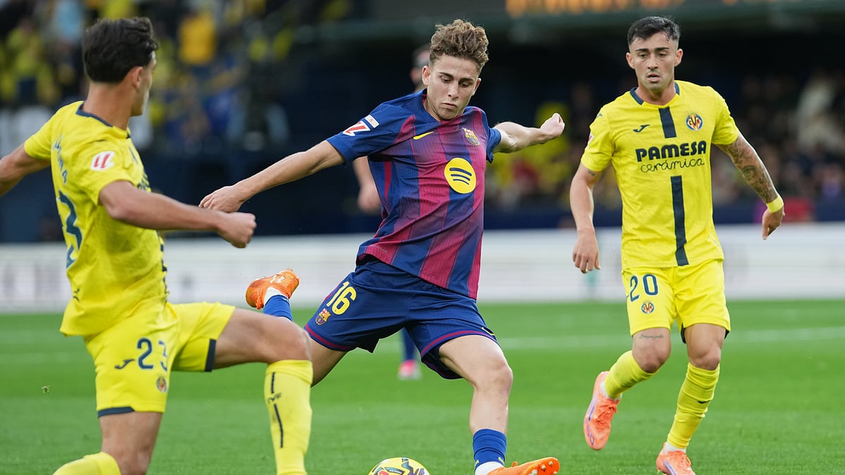 AP : Villarreal host Barcelona for a top-of-the-table La Liga clash.